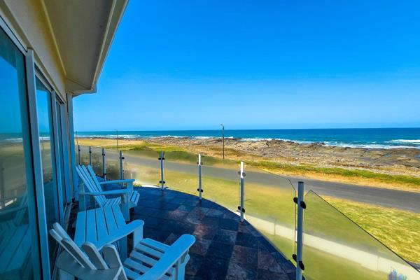 This breathtaking double story home offers the epitome of coastal living, with ...