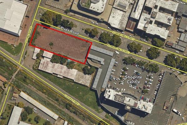 The paved vacant land has a prime corner location in the CBD of Florida and next to the ...