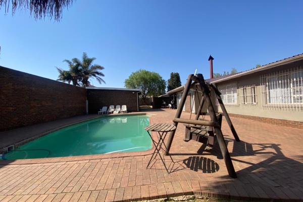 This family home is situated in Kempton Park inside enclosed area and offers the following:

Entrance hall. Open plan lounge with a ...