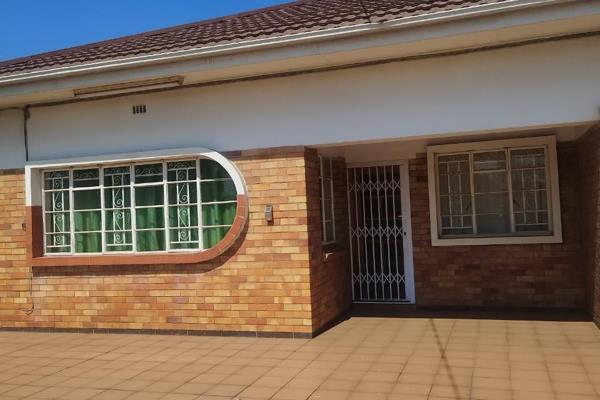 The spacious 4 bedrooms house  with bic to rent in delville in germiston , kitchen with built in cupboard,  clean bathroom with shower ...