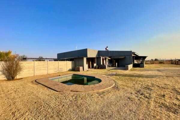 Welcome to this versatile farm property, featuring two well-appointed houses, each designed for comfortable living in a peaceful rural ...