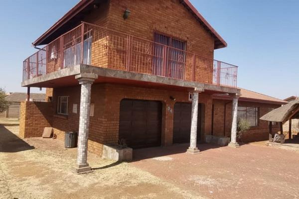 This cost effective face brick double storey home offers peace of mind and easy access ...