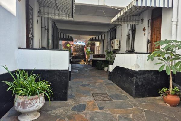 Quaint 2-bedroom duplex nestled within the heart of Umbilo. Modern charm meets original ...