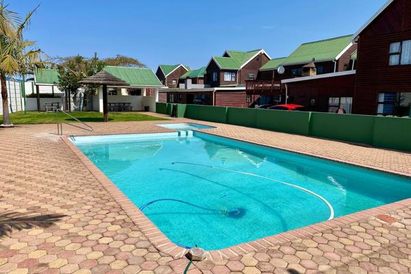 This open-plan townhouse, located in the heart of Hartenbos, offers a comfortable and ...