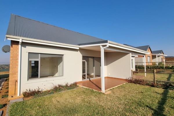 Easy level access into a spacious open-plan living-dining-kitchen area that leads out onto a roofed verandah. The verandah may be ...