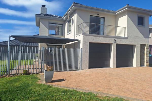 Spacious Double Storey Family Home

Welcome to this beautiful, newly built double-storey home in the desirable Hartenbos Heuwels. ...