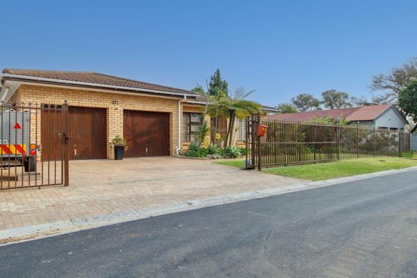 This charming face brick home boasts generous living spaces and ample accommodation. It ...