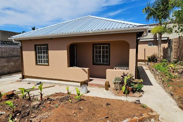 TEAM SHANE PROPERTIES | Fully renovated and tiled 2 bedroom house with separate outbuilding. Conveniently situated within walking ...