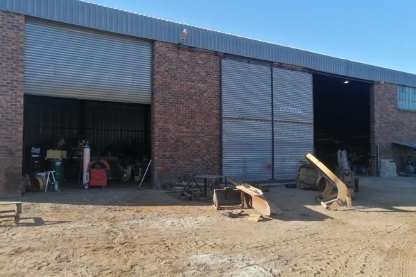 Front Area:
Reception Area:
A welcoming space for visitors and clients, situated at the front of the warehouse.
Three ...