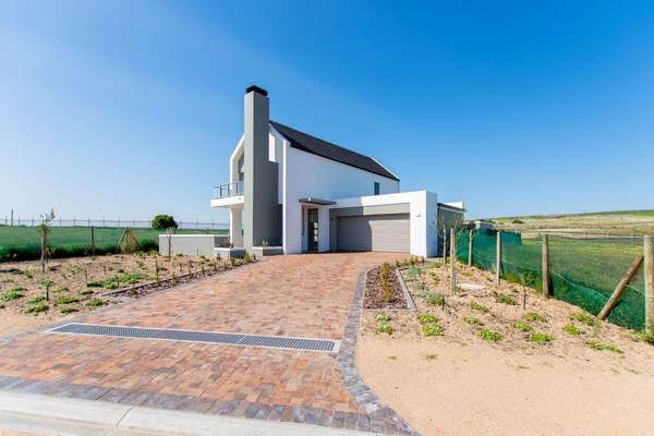 Located in the scenic Langebaan Country Estate, this brand-new north-facing 2-bedroom ...