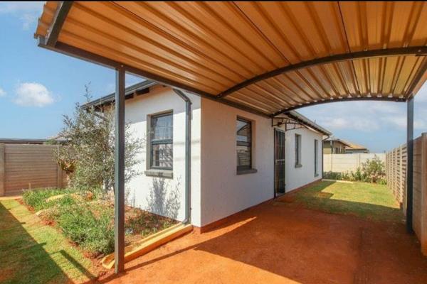 A cozy two bedroom house for sale with at protea glen with a seemingly open plan lounge ...