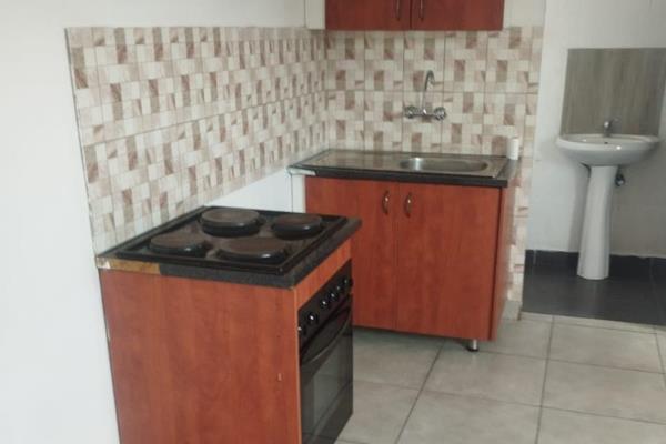 Newly built flatlet with modern features.  Bathroom with shower and fitted ...