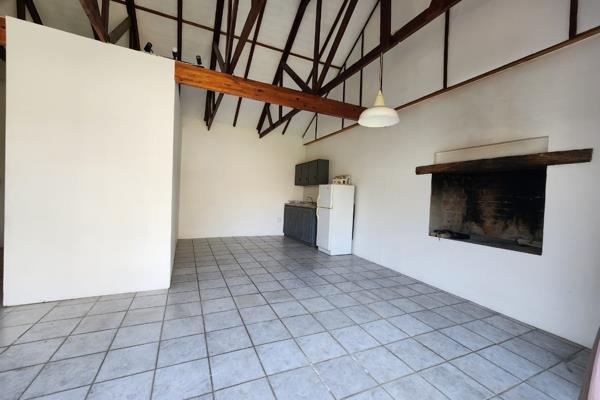 Open plan kitchen/lounge with built-in braai. Safe parking for your vehicle. ...