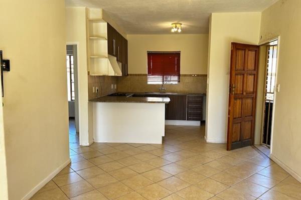 Exclusive to Seeff Properties - Tucked away for privacy, this corner ground unit offers two well sized bedrooms, built-in cupboards ...