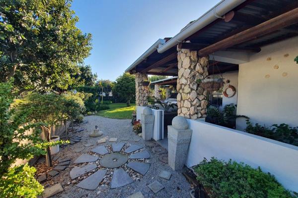 From the moment you drive through the automated entrance gate, you get the tranquility of your new home by the sea. You are met with a beautiful garden, well established trees, shrubs and so much more.

The stoep is well planned to be used thoroughly, with an outdoor braai. ...