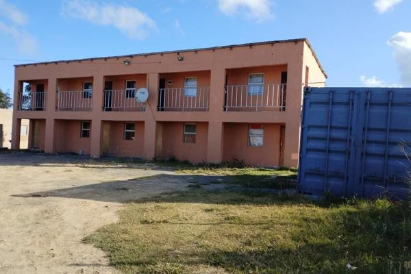 Grab these 10 income generating flats built a few kilometers to King Phalo Airport in East London. 

They are next to the taxi rank ...