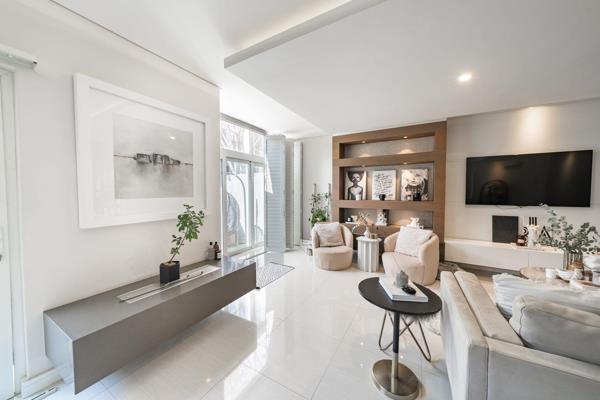 As you step into this stunning three-level cluster home, you&#39;re greeted by sleek modern stairs leading to an open-plan lounge area. ...