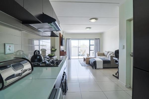 I am excited to present this 3 Bedroom Garden Apartment for Sale in the popular Greenstone Ridge Lifestyle Estate!
- Located on the ground floor. 
- The open plan kitchen is dressed stylish cabinets, a modern tiled backsplash,  ...