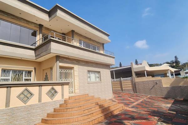 Located in Asherville are two well presented units. Live in one and rent out the other.
Enter the property via security gate into a ...