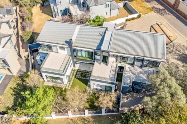 Discover this stunning modern 4-bedroom home, available for rent, situated in the prestigious Helderfontein Estate. Boasting panoramic ...