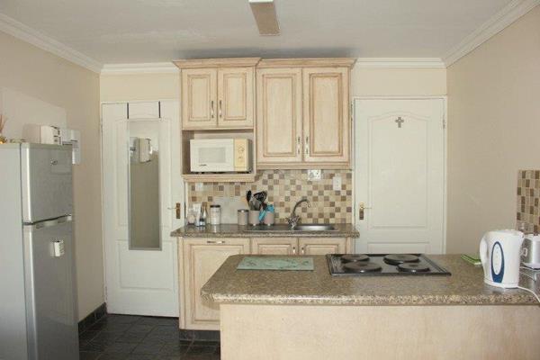 Bachelor flat at Gold Stone Estate. Kitchen has stove and oven. Washing machine ...