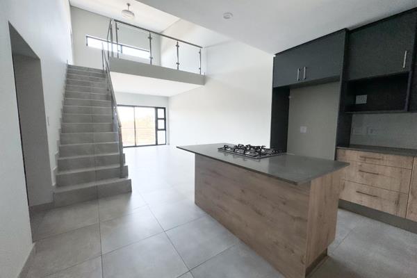 Welcome to your dream home in the heart of Die Hoewes—a striking ultra-modern loft ...