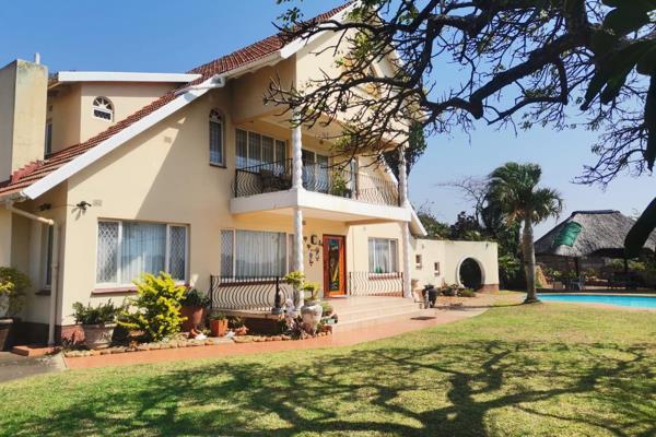 UNIQUE, MODERN HOME - 4 BEDROOMS 

Set on a hill overlooking Amanzimtoti and the ocean, this very Unique &#39;A&#39; frame house has ...