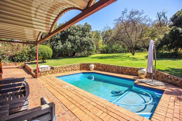 Proudly brought to you by Seeff Pretoria East. This beautiful, north facing family home nestled in a lush, green garden (with a ...