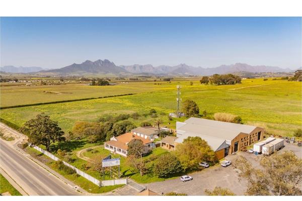 Situated on the R101close to Koelenhof, this expansive 1.6-hectare property offers a unique blend of agricultural zoning and commercial ...