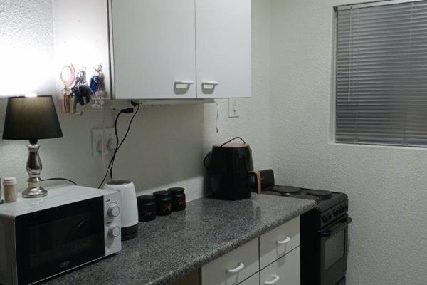 Two-bedroom unit, with a single bathroom.
Open plan lounge and kitchen.
Pre-paid electricity.
Water fixed rate at R ...