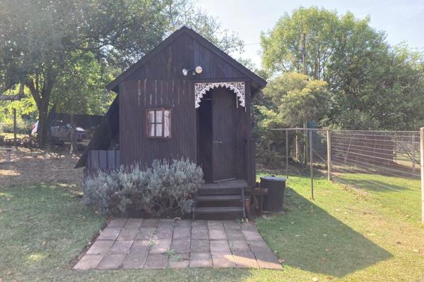 Situated amidst wide open spaces, this cozy wooden cottage offers the perfect setting to unwind and reconnect with nature.  The ...