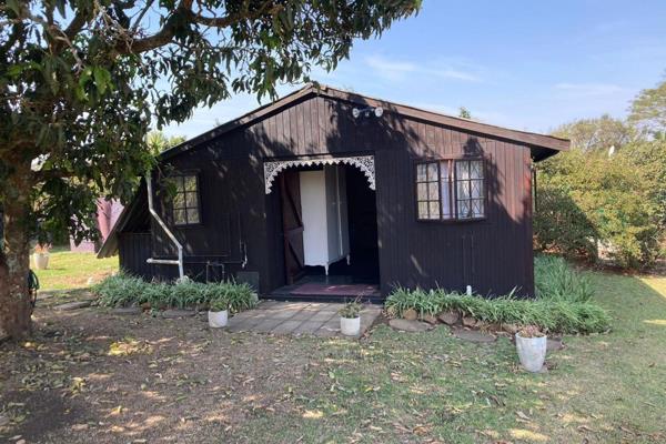 Found amidst a beautifully manicured garden, this charming 1 bedroom log cabin offers the perfect blend of country living and modern ...