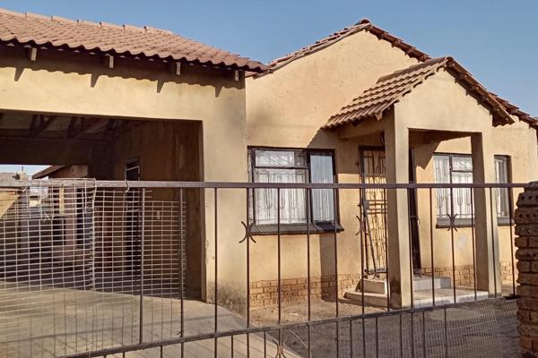 The house features three comfortable bedrooms, each spacious enough to accommodate a bed ...