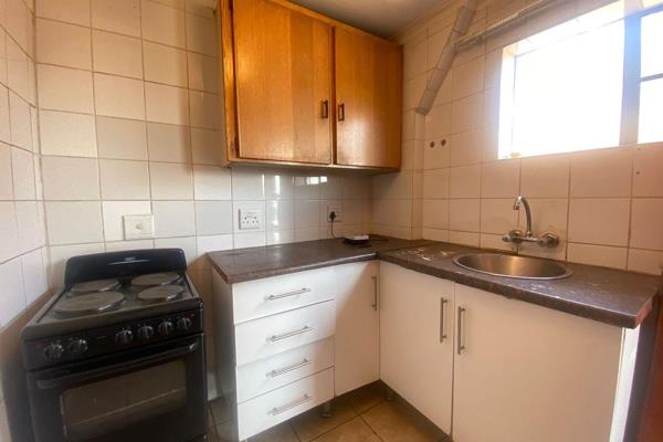 This compact bachelor apartment is perfect for a single person seeking an affordable living space. It offers a small kitchen and living ...