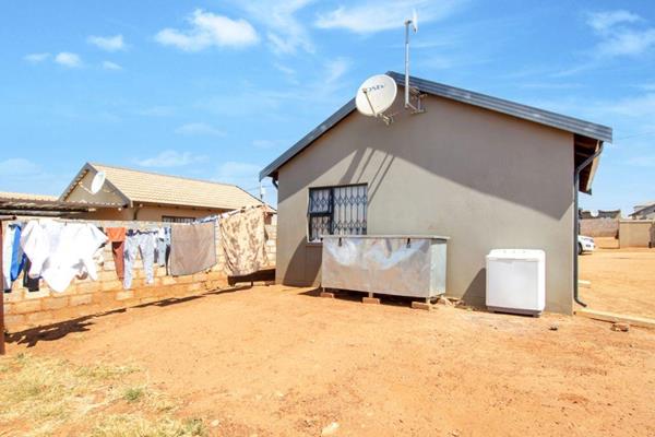 Step into this inviting two-bedroom home, where comfort and style meet. The property features a modern bathroom designed for ...