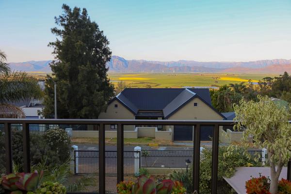 On the Golden Mile of Riebeek West, this remarkable property offers unparalleled views ...