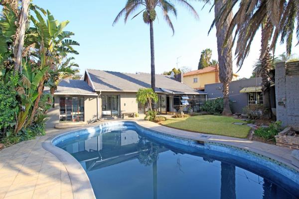 At the heart of this home is a delightful entertainment area, featuring a built-in braai and swimming pool—ideal for hosting gatherings ...