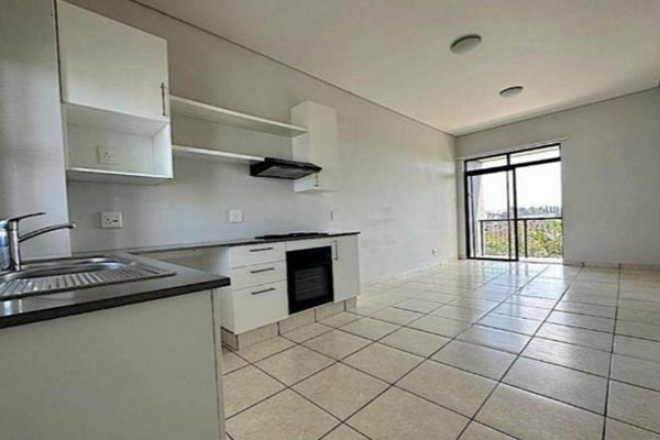 The apartment offers an open plan kitchen, fitted with granite top ,oven and hob. There is also space for one under counter plumbed ...