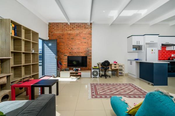 The living is easy in this impressive, urban yet contemporary abode with a modern art ...