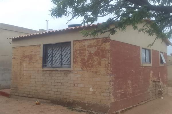 House with 1 bedroom, kitchen, dining, bathroom. House features 3 outside rooms, outside toilet and is fully walled.