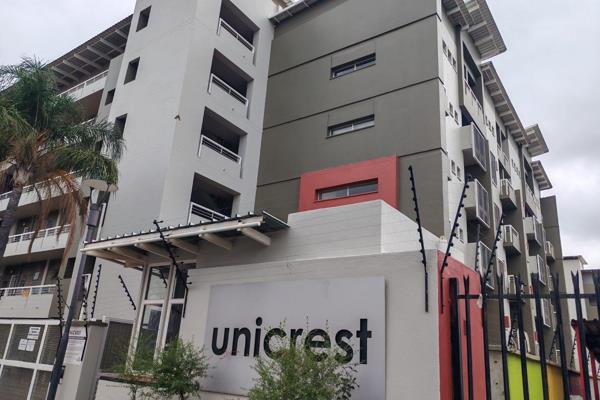 This spacious 2 bedroom unit is situated in the popular Unicrest apartment building and ...