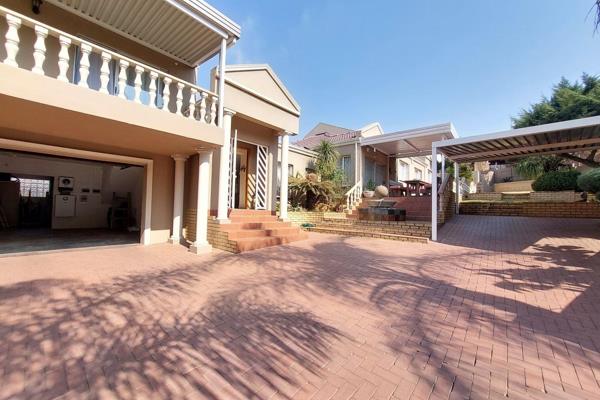 Situated in a quiet cul de sac in a prestigious suburb, this luxurious family home ...