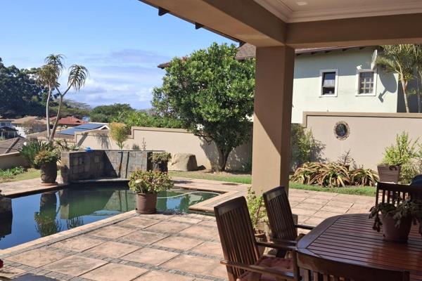 This Home is Located in a secure estate.
Entering the property you will find a pretty garden surrounding the pool in the front of the ...