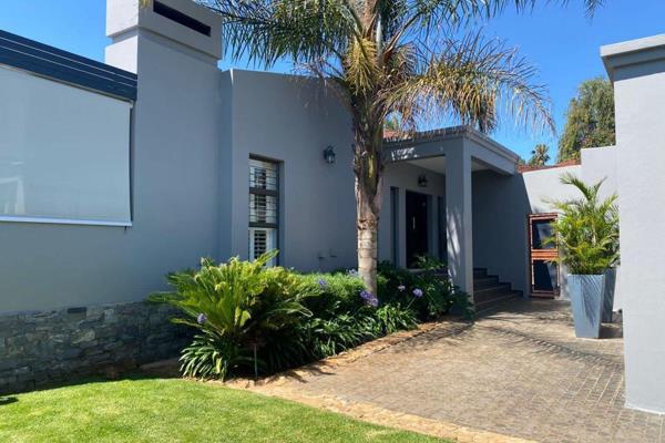 The entrance hall of this modern Oasis of comfort and Style leads onto the spacious open planned dinning area with elegant scatter ...