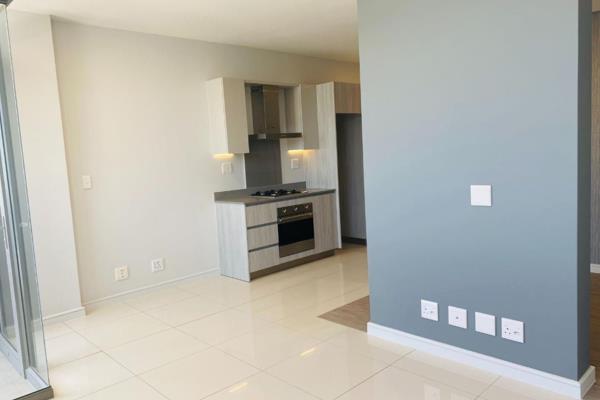 Beautiful apartment available at The Median.  Open-plan kitchen with volumes of kitchen ...