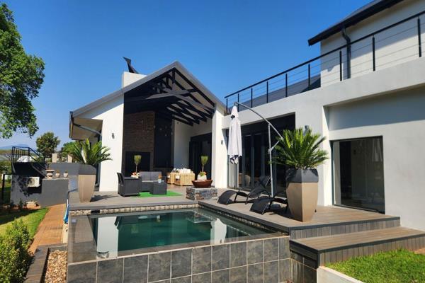 This truly wonderful very modern 5 bedroom house is situated in Doornhoek complex which is of the highest standard and gives you the ...