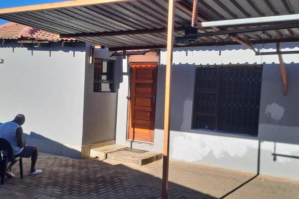 3 bedroom house with in-suite in main bedroom, sitting and dining, fitted kitchen, bathroom, carport, walled and gated.