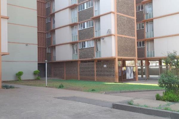 A spacious and versatile apartment with a charming layout in Arcadia Pretoria to add to ...