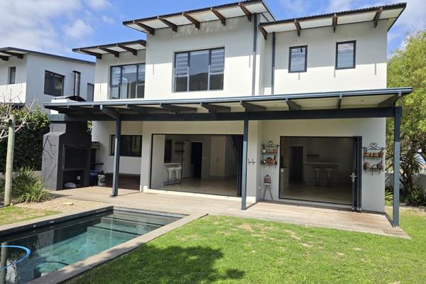 Long term unfurnished rental available in a highly sought after gated community - Onrus River. 
The double automated garage leads into ...