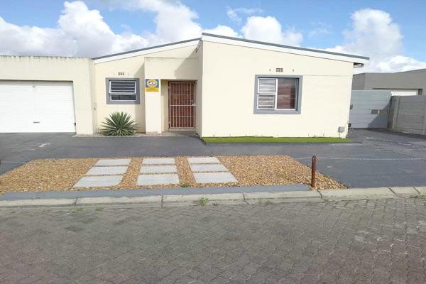 Buy into this peaceful neighbourhood.

This Three bedroom house is very low maintenance ...